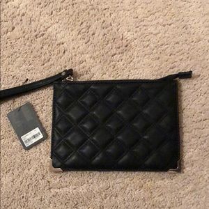 Black clutch from forever 21. Tag still attached.